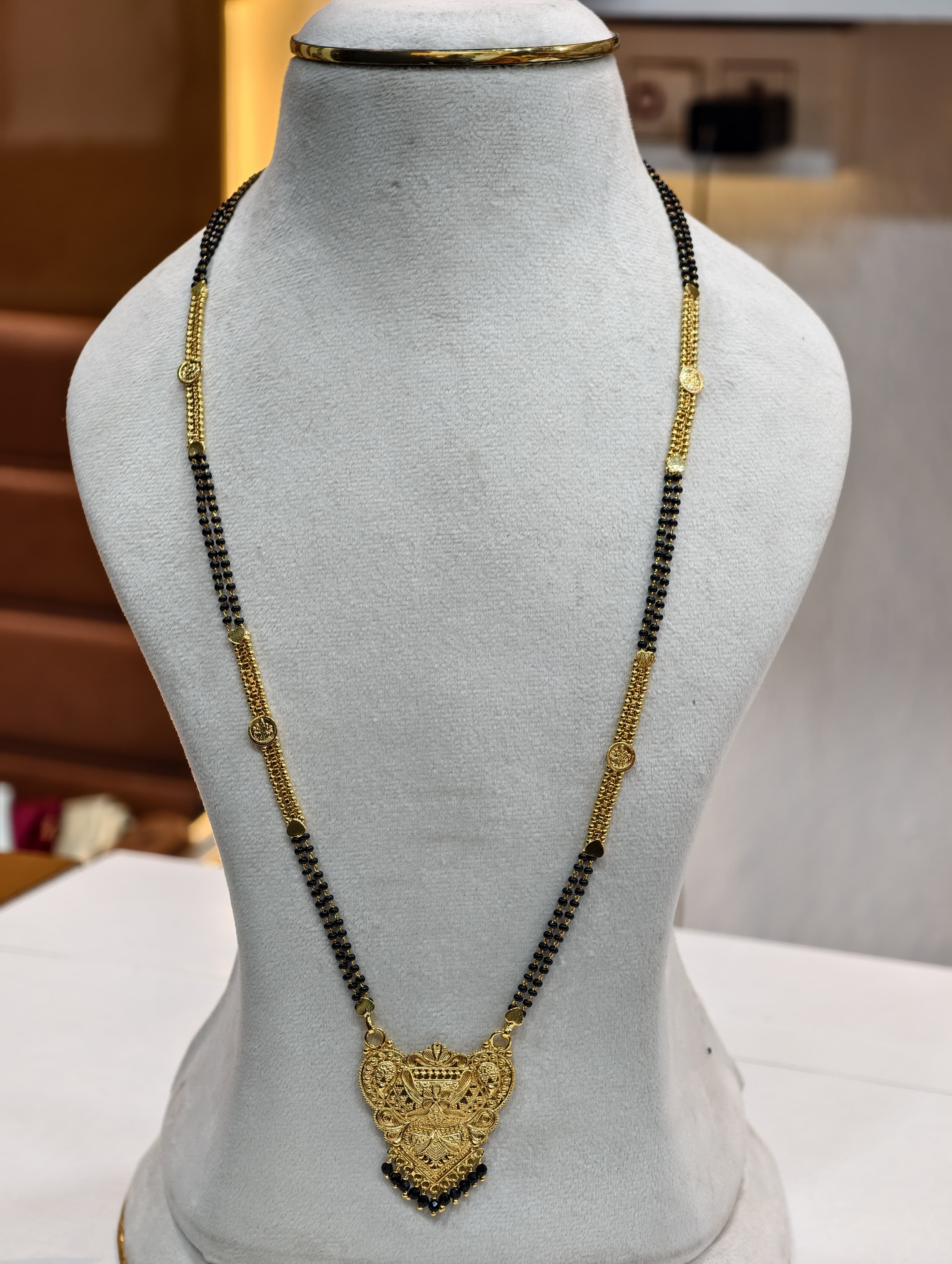 Gold Model Long Black Beads