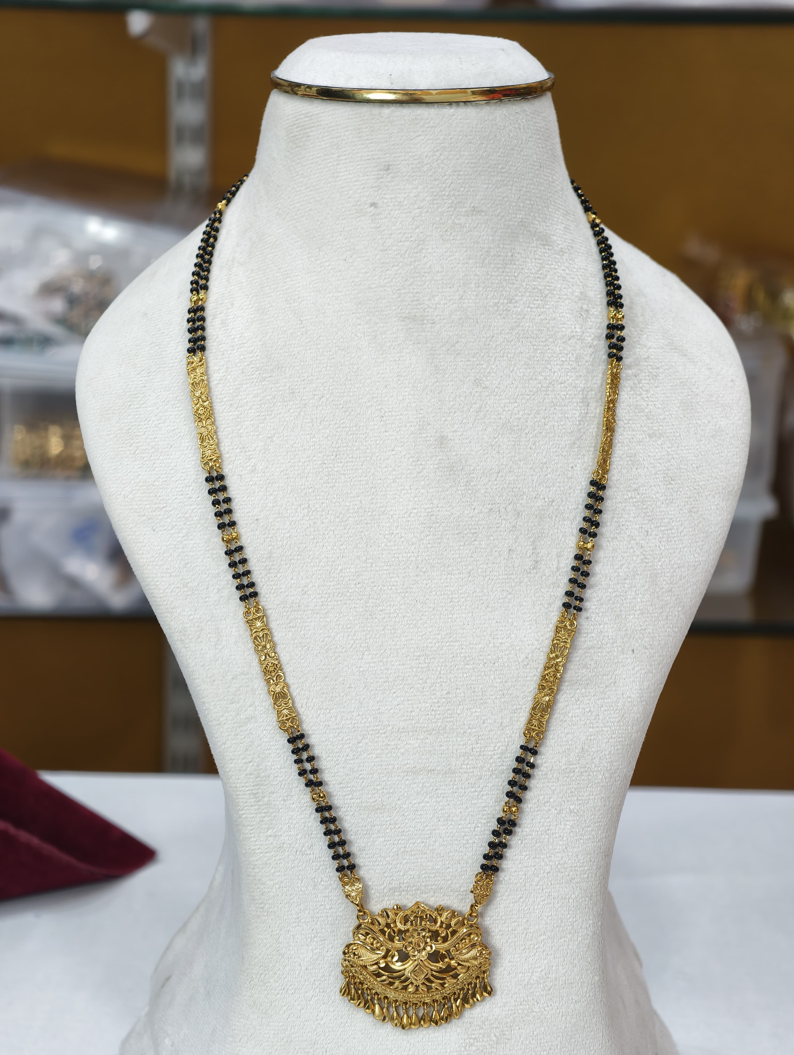 Gold Model Long Black Beads