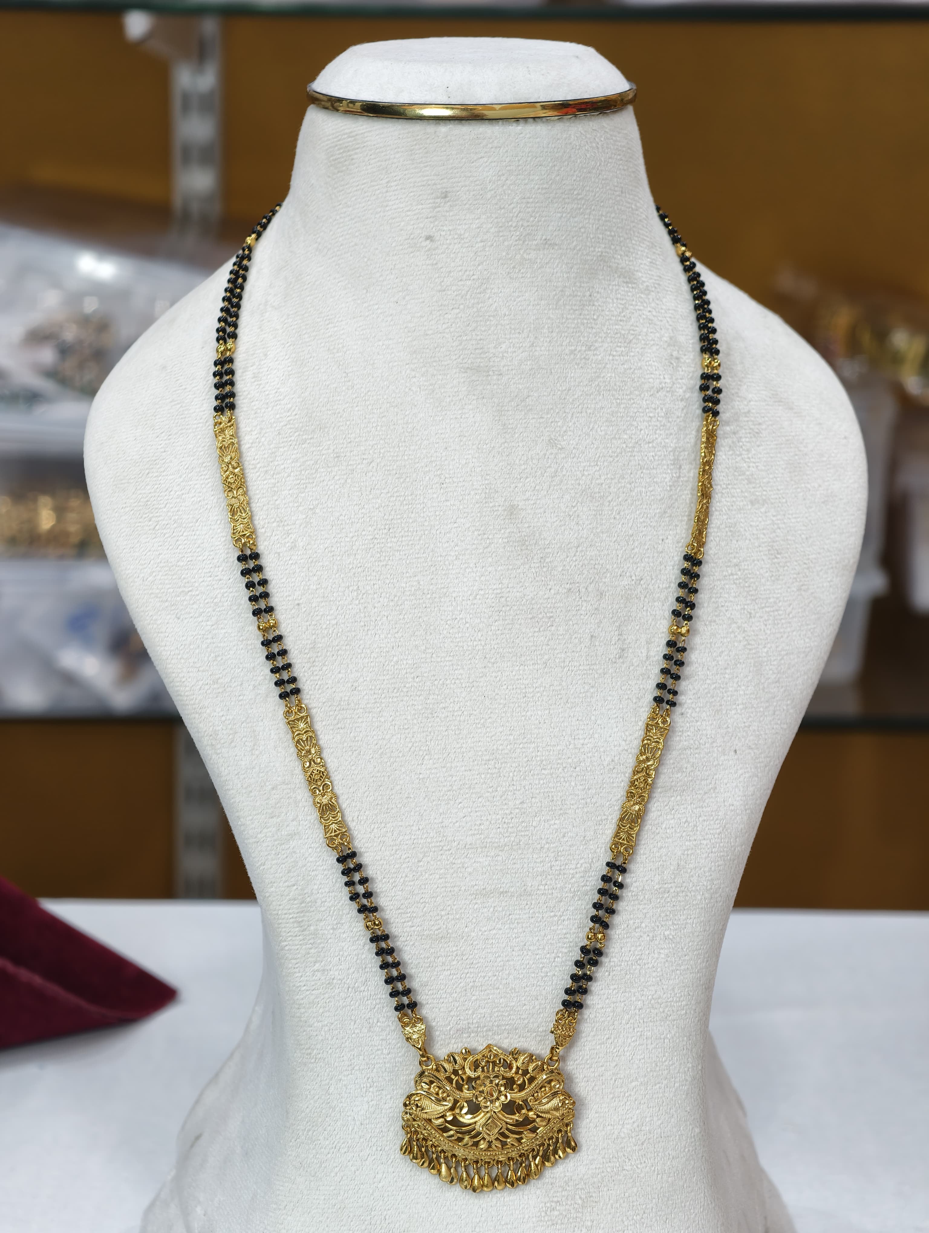 Gold Model Long Black Beads