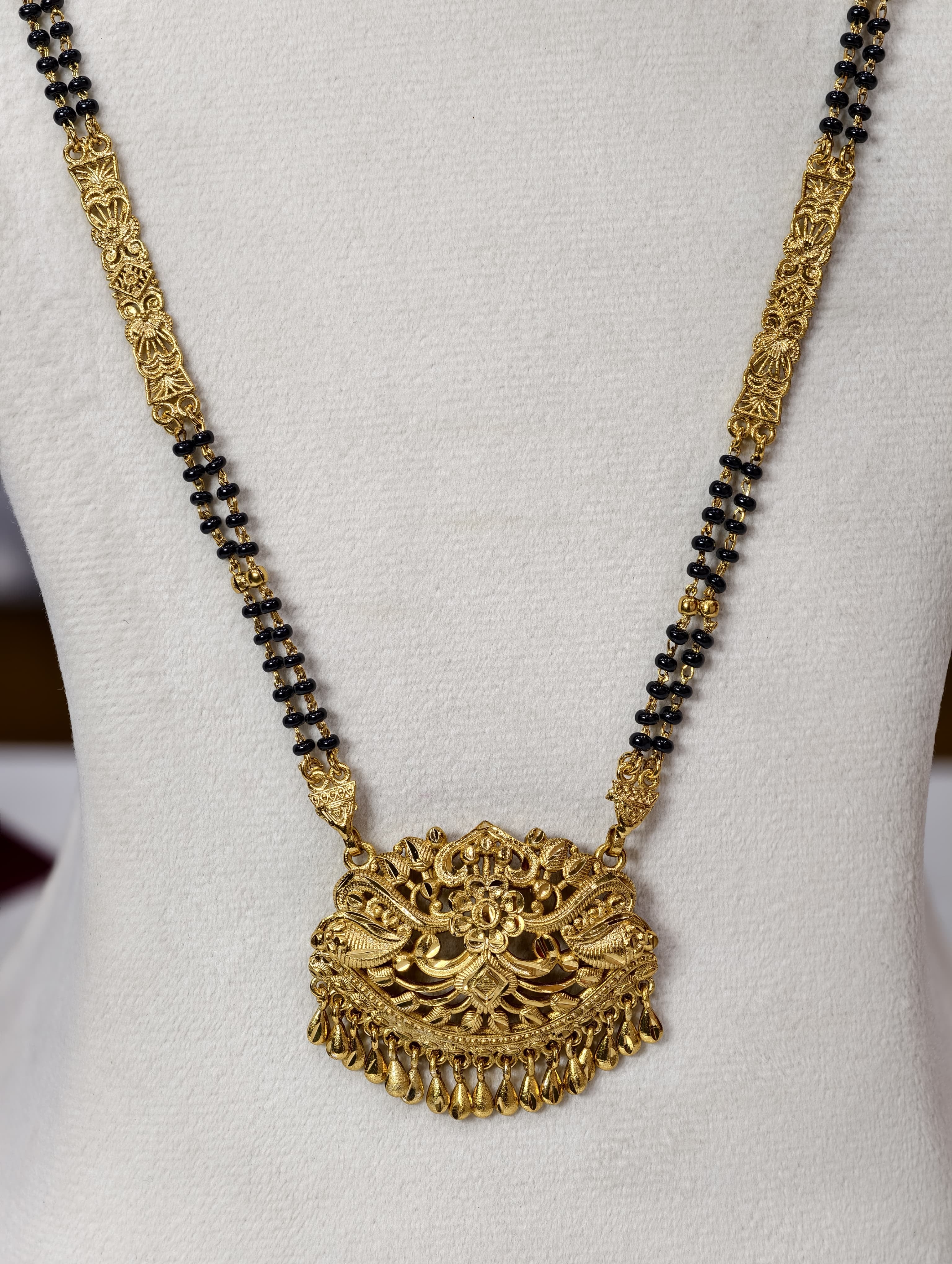 Gold Model Long Black Beads