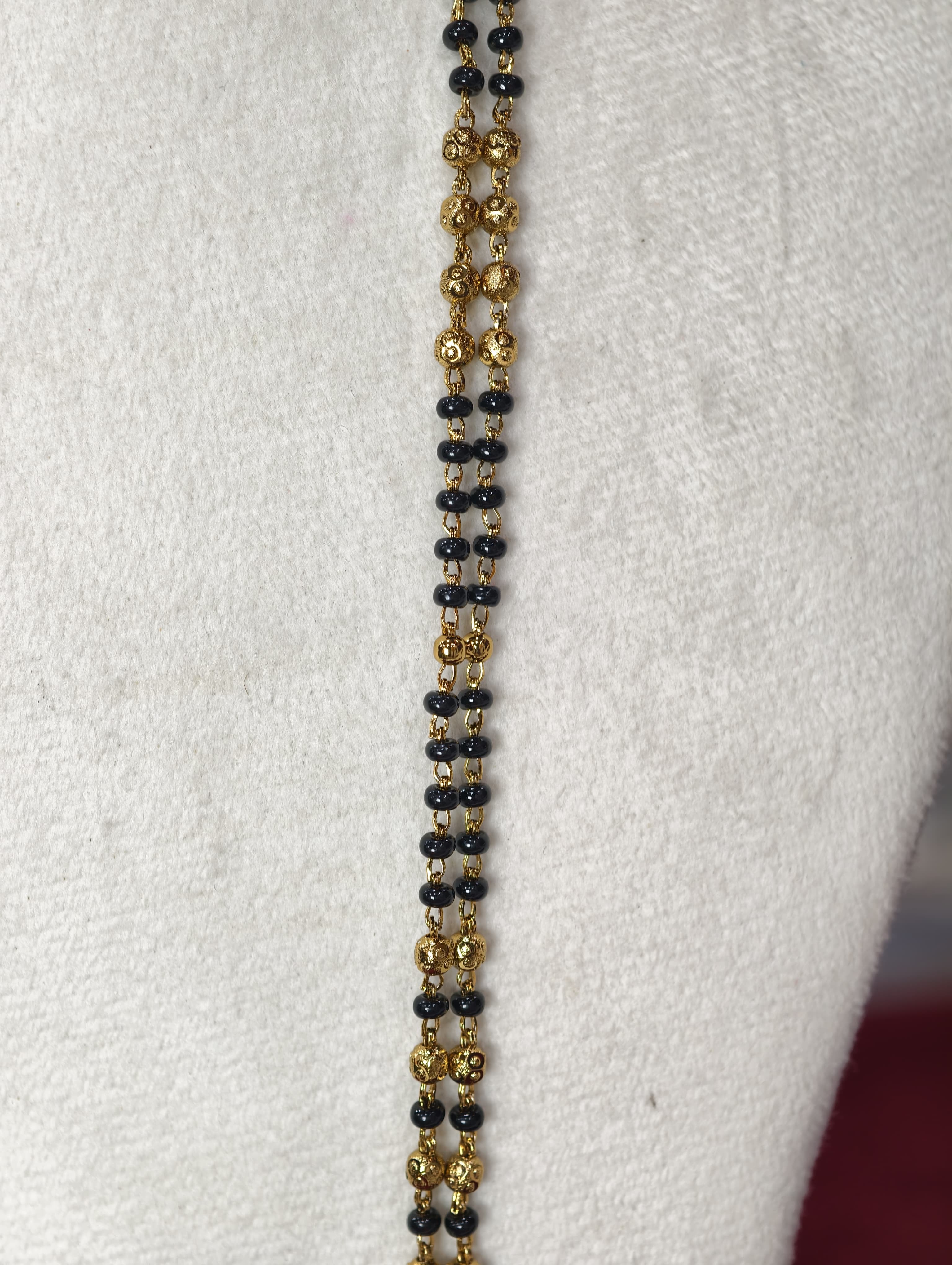 Gold Model long Black Beads