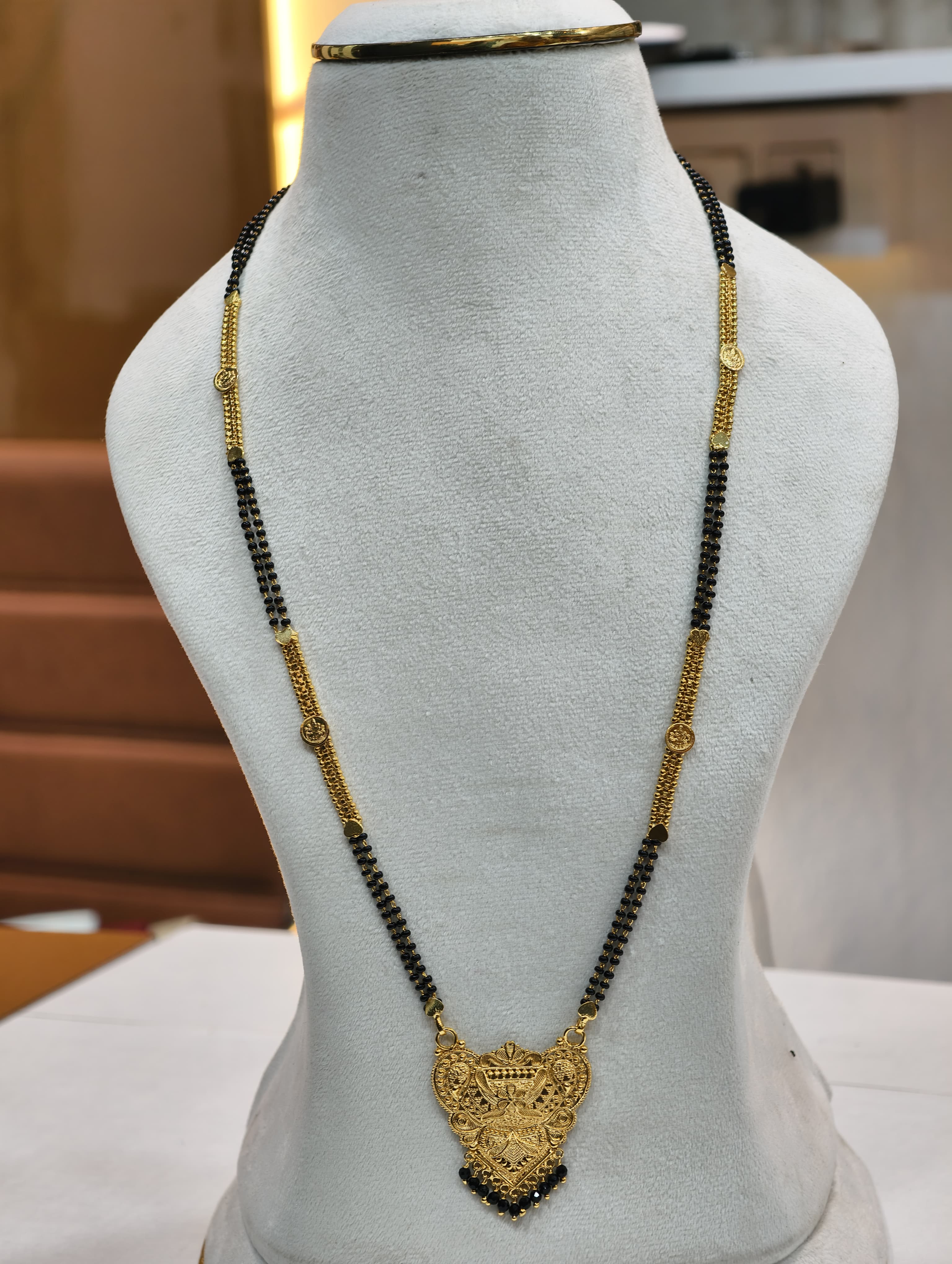 Gold Model Long Black Beads