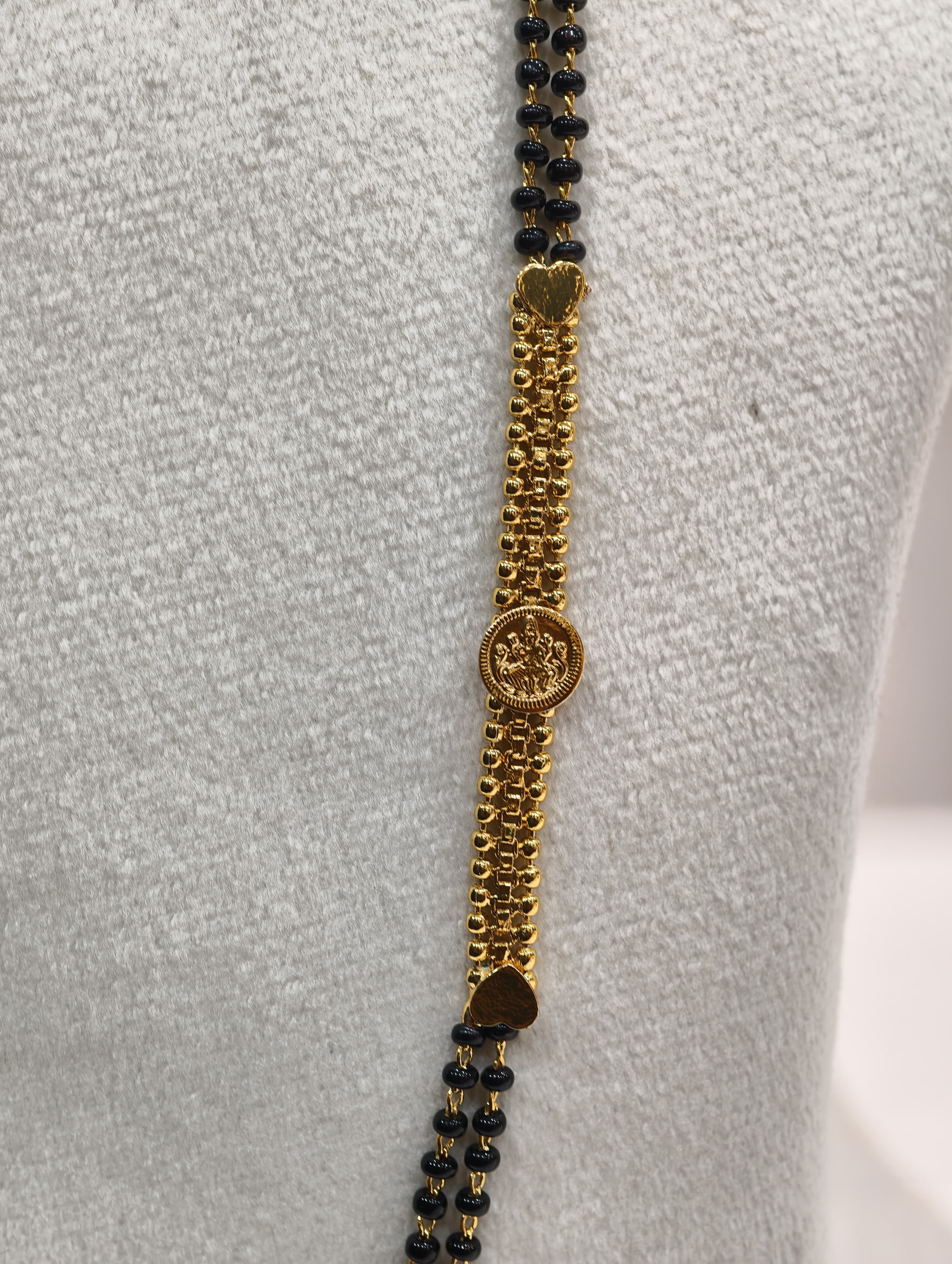 Gold Model Long Black Beads